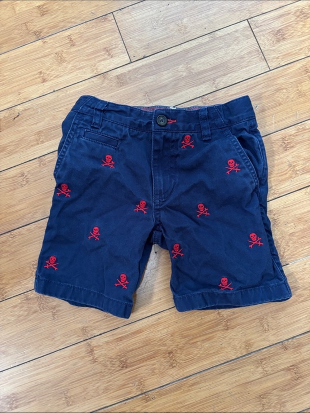 Boden Navy Shorts with Red Skull Design
